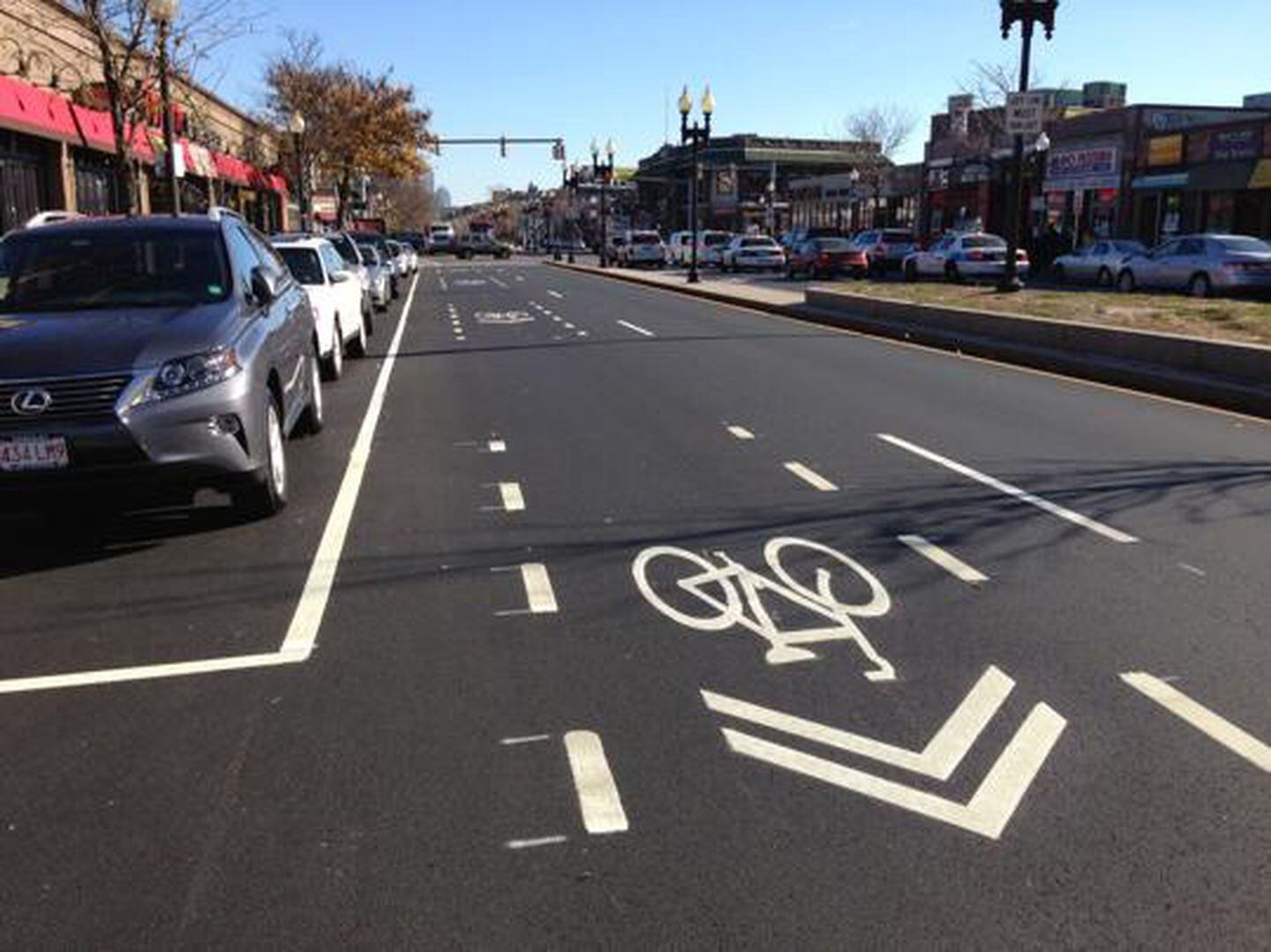 Brighton Avenue in Allston with bicycle-priority icons marks.